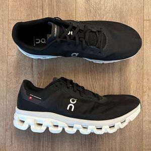 On Running Black and White Athletic Shoes